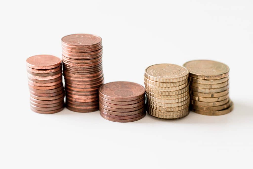 ibrahim-rifath-OApHds2yEGQ-unsplash Five stacks of coins